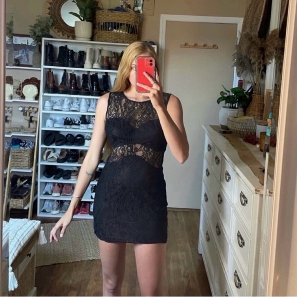 Tobi Black Lace Mini Dress in a size medium has built in coverage